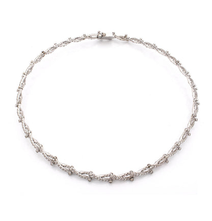 "ABBRACCIO DI LUCE" - ORO BIANCO 18KT E DIAMANTI BIANCHI