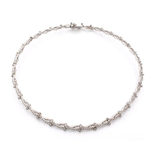 "EMBRACE OF LIGHT" - 18KT WHITE GOLD AND WHITE DIAMONDS