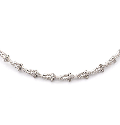 "ABBRACCIO DI LUCE" - ORO BIANCO 18KT E DIAMANTI BIANCHI