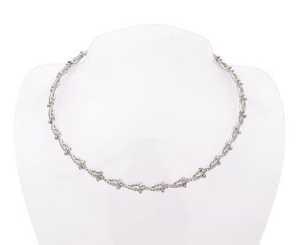 "ABBRACCIO DI LUCE" - ORO BIANCO 18KT E DIAMANTI BIANCHI